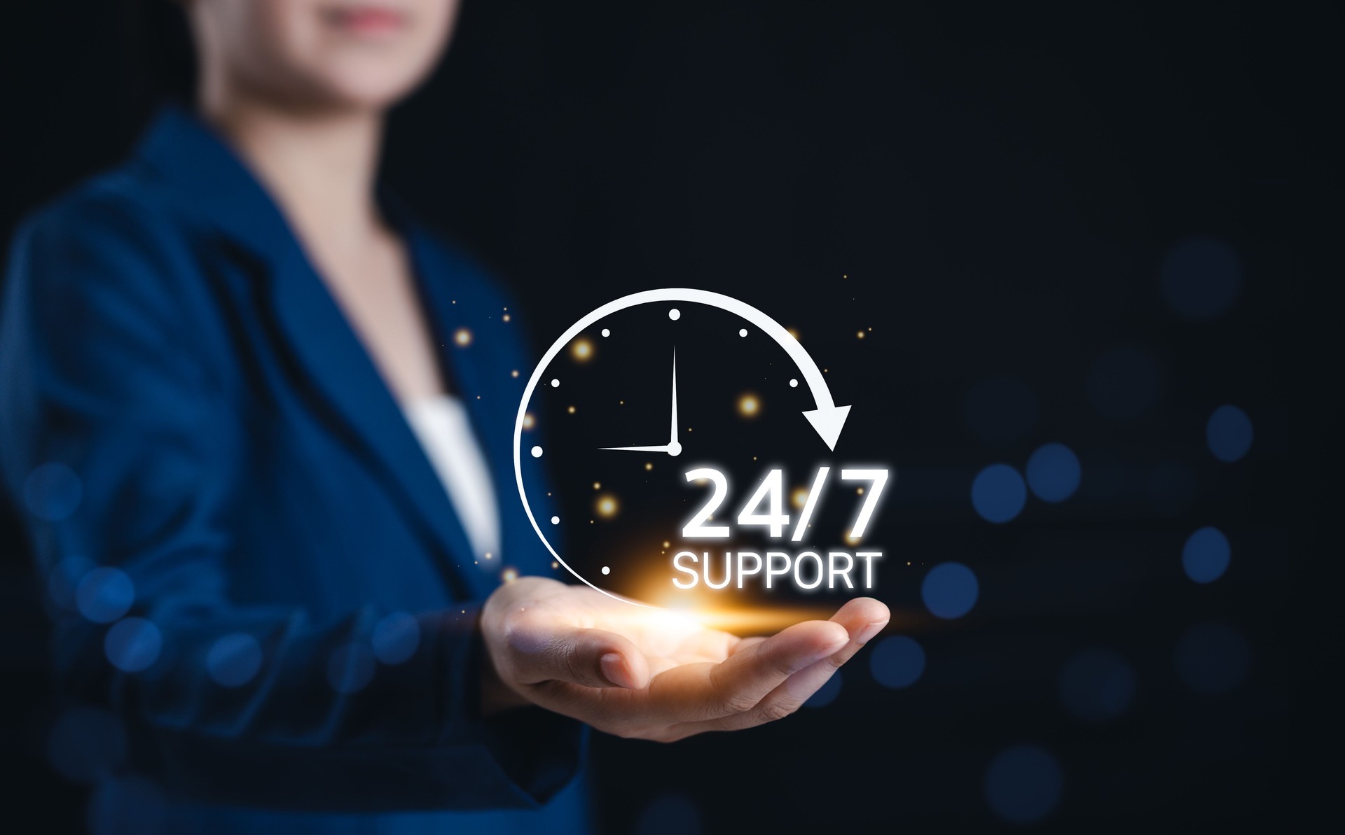 24/7 continuous support service concept. Businesswoman presents glowing icon representing 24/7 customer support, symbolizing nonstop assistance, helpline service, and reliable customer care solutions.
